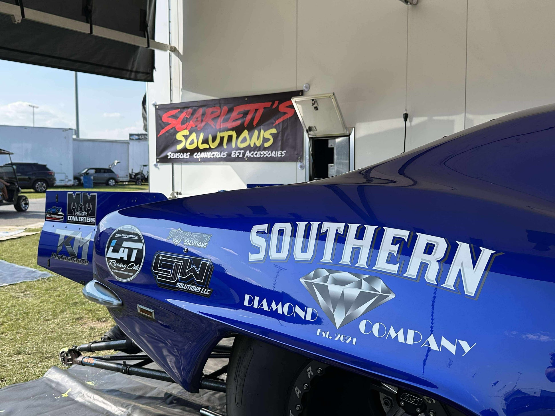 Scarletts Solutions Banner in pro mod pits