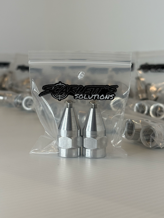 Pair of aluminum shock sensor nuts in packaging from Scarlett's Solutions, designed for 1/2-20 shock bolts.